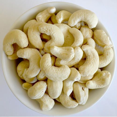 CASHEW NUTS Product Details :- Shelf Life3 Months ColorWhite Product TypeFinish product StyleFresh Grade180 Size18mm FlavorNatural VarietyCashew Processing