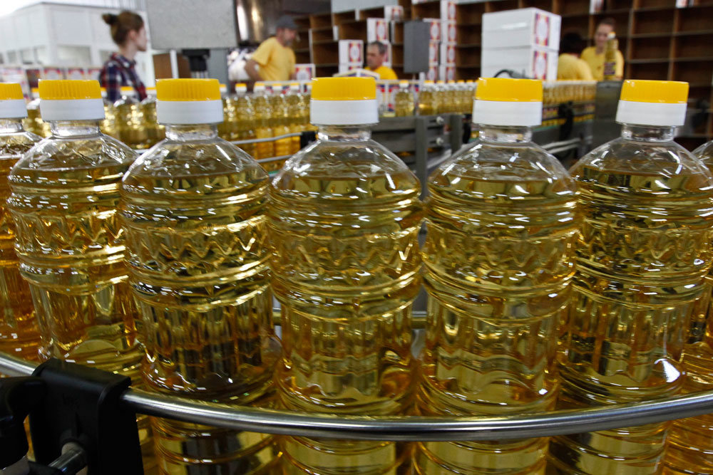 Canola oil is a vegetable oil derived from a variety of rapeseed that is low in erucic acid, as opposed to colza oil