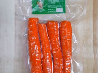 Peeled carrots, dragged in different shapes and vacuumed