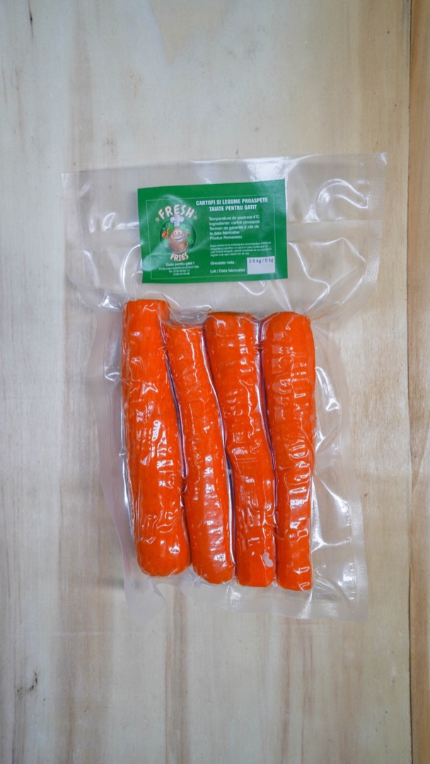 Peeled carrots, dragged in different shapes and vacuumed