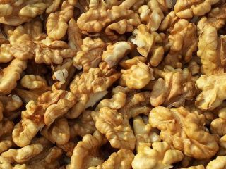 Selling peeled walnuts. Divided by colors and factions. We