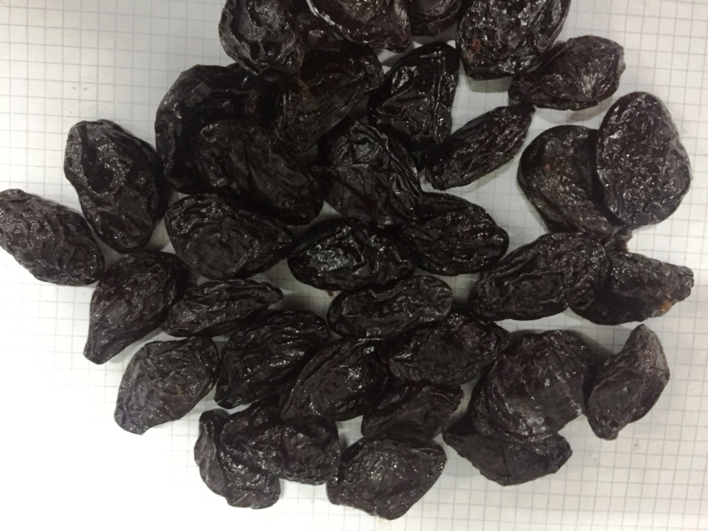 We have dried un-pitted prunes in stock for sale