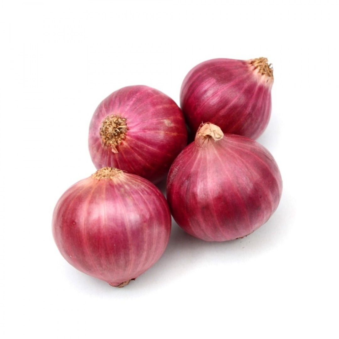 Organic red onions relieving a number of diseases including the common cold, asthma, bacterial infections, respiratory problems, angina, and cough